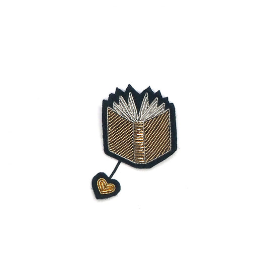 Broche - Livre